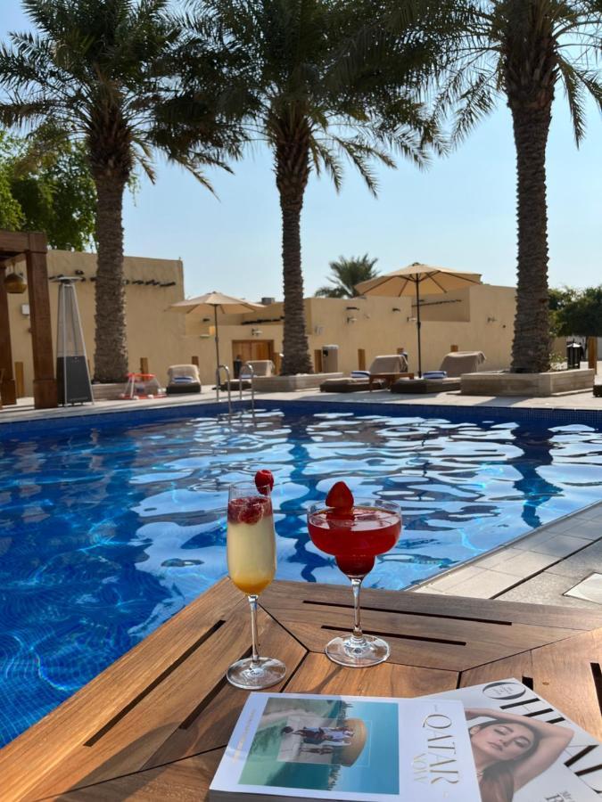 Souq Al Wakra Hotel Qatar By Tivoli Al Wakrah Bagian luar foto The pool at the Ritz-Carlton, Manama