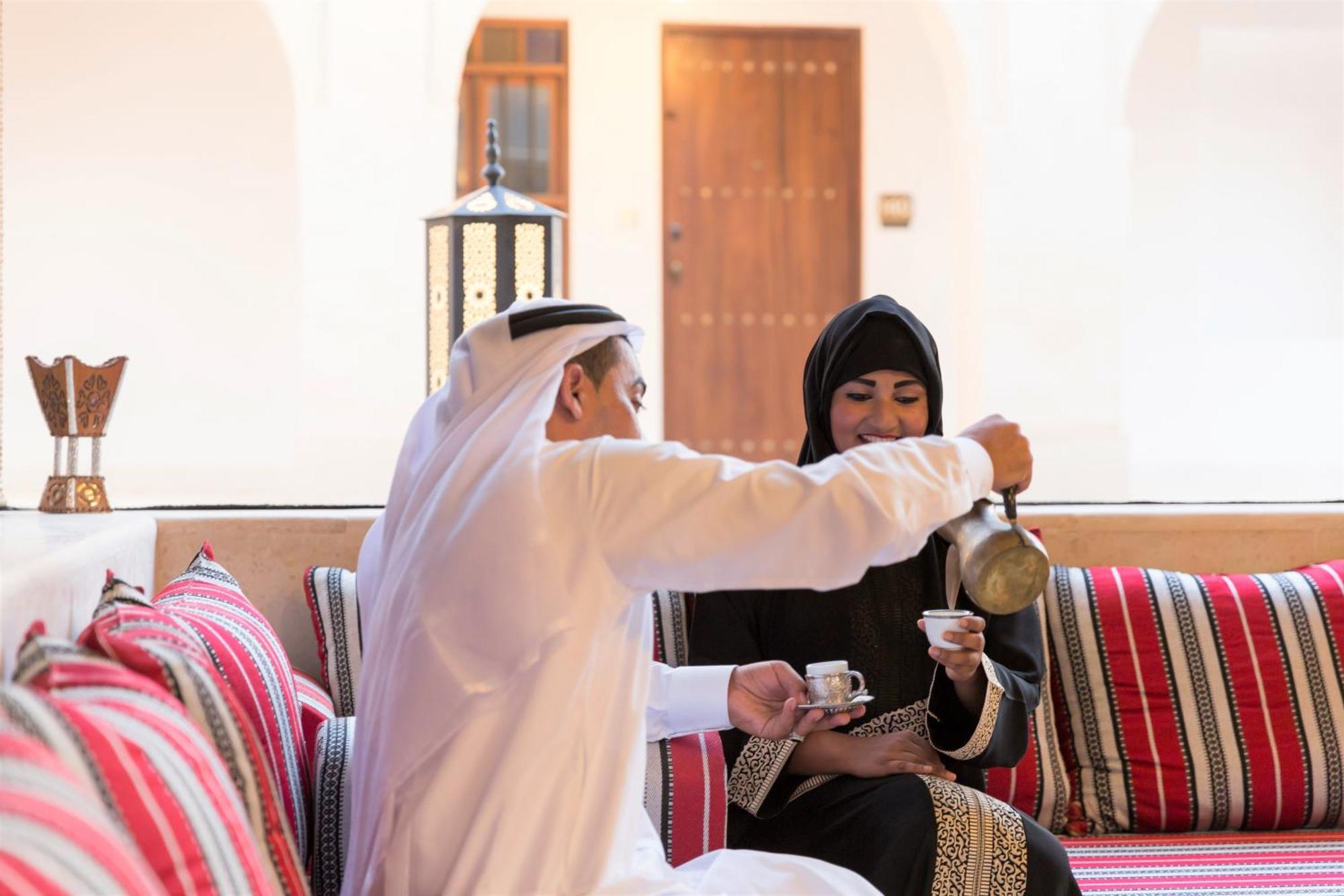 Souq Al Wakra Hotel Qatar By Tivoli Al Wakrah Bagian luar foto A man and a woman in traditional Arabian dress