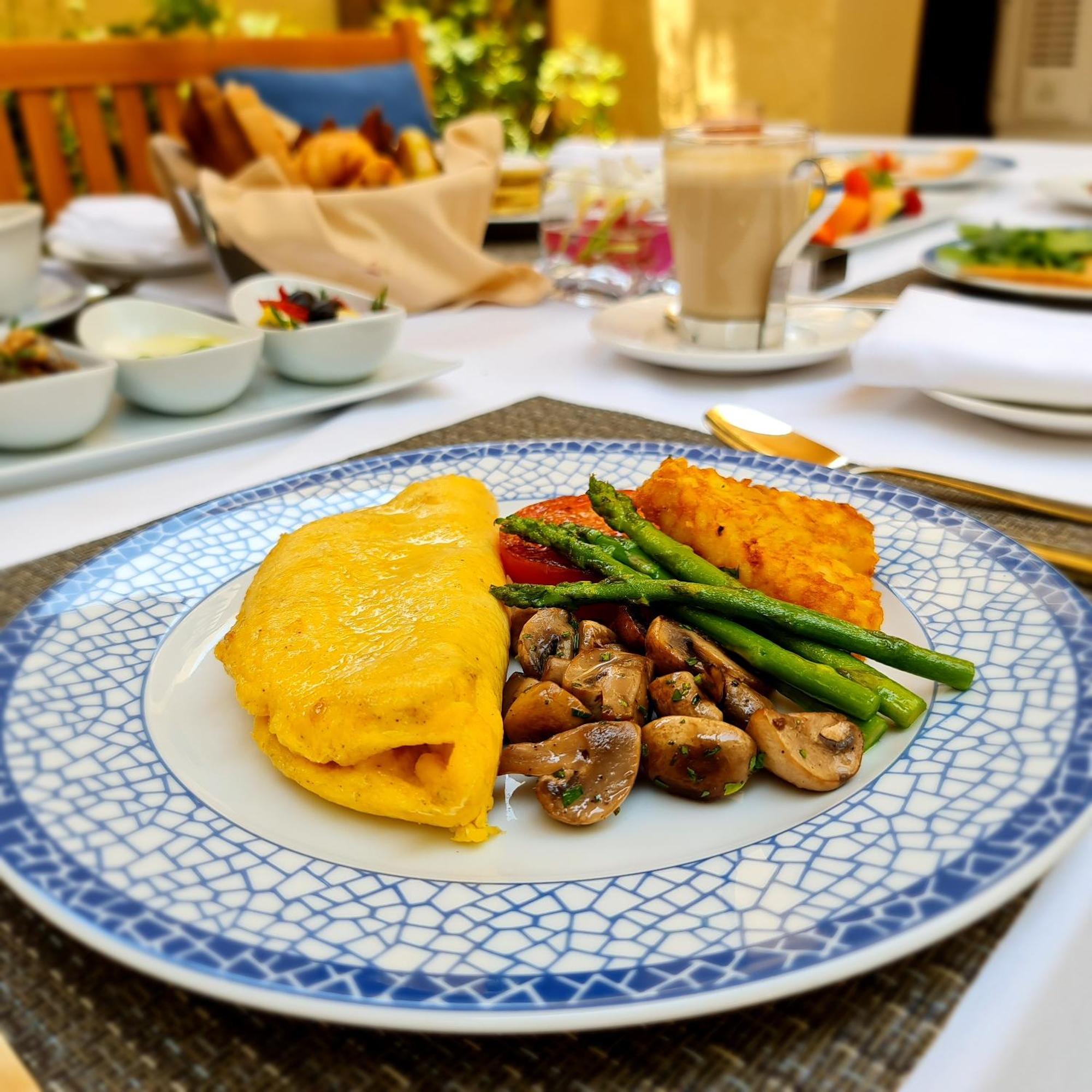 Souq Al Wakra Hotel Qatar By Tivoli Al Wakrah Bagian luar foto An omelette with asparagus and mushrooms