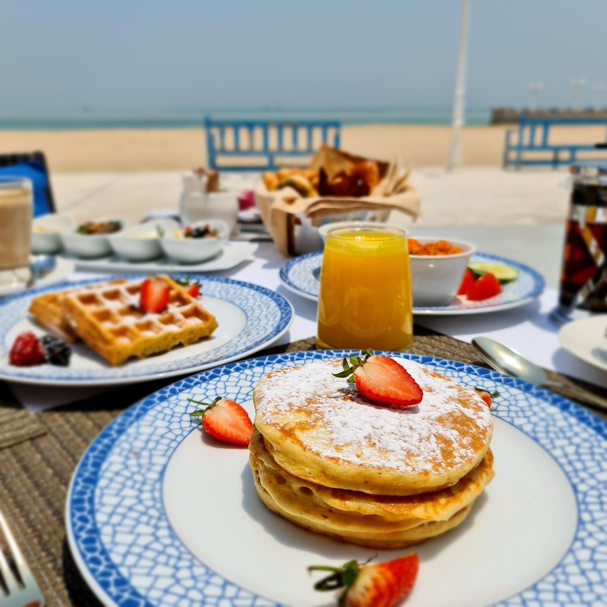 Souq Al Wakra Hotel Qatar By Tivoli Al Wakrah Bagian luar foto Pancakes with orange juice