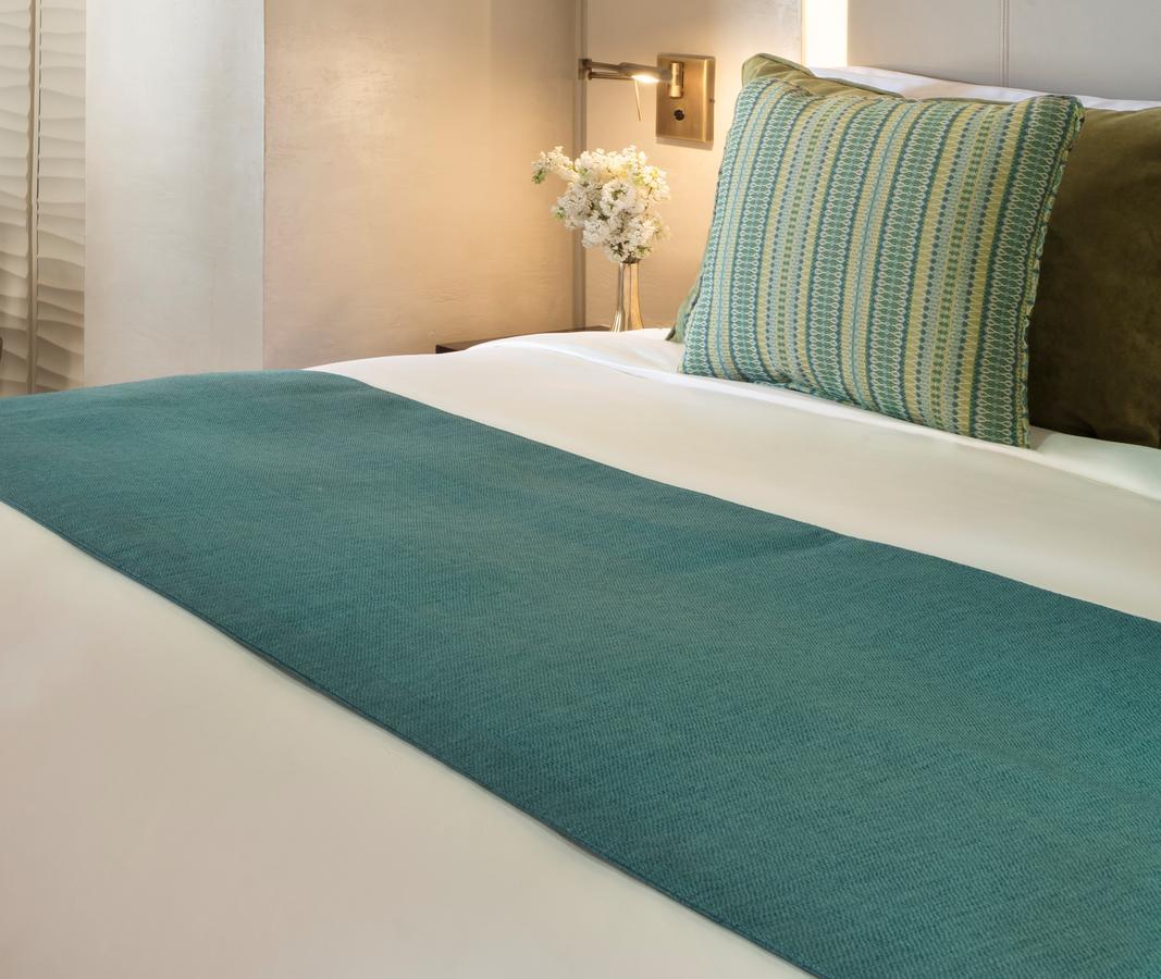 Souq Al Wakra Hotel Qatar By Tivoli Al Wakrah Ruang foto A bed runner